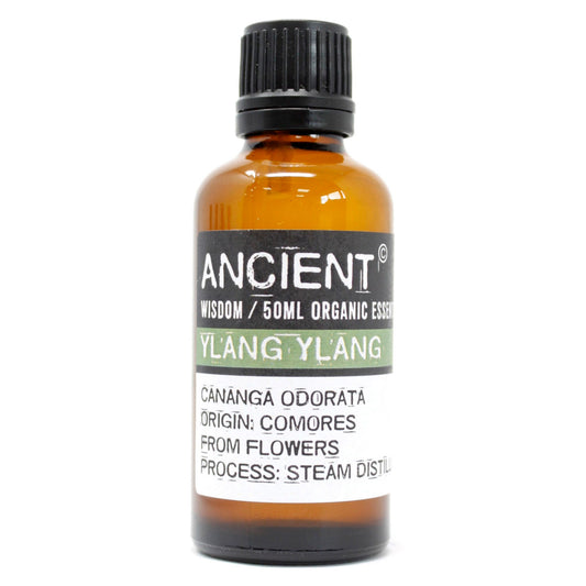 Amber glass bottle of Ancient Wisdom Ylang Ylang organic essential oil.