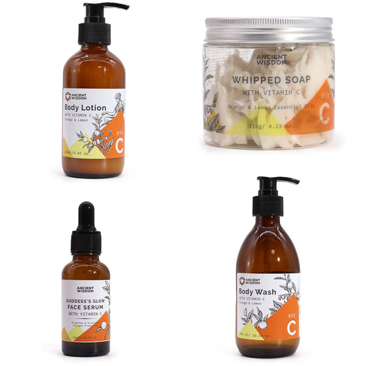 Glow & Refresh Luxe Set featuring body lotion, whipped soap, face serum, and body wash.