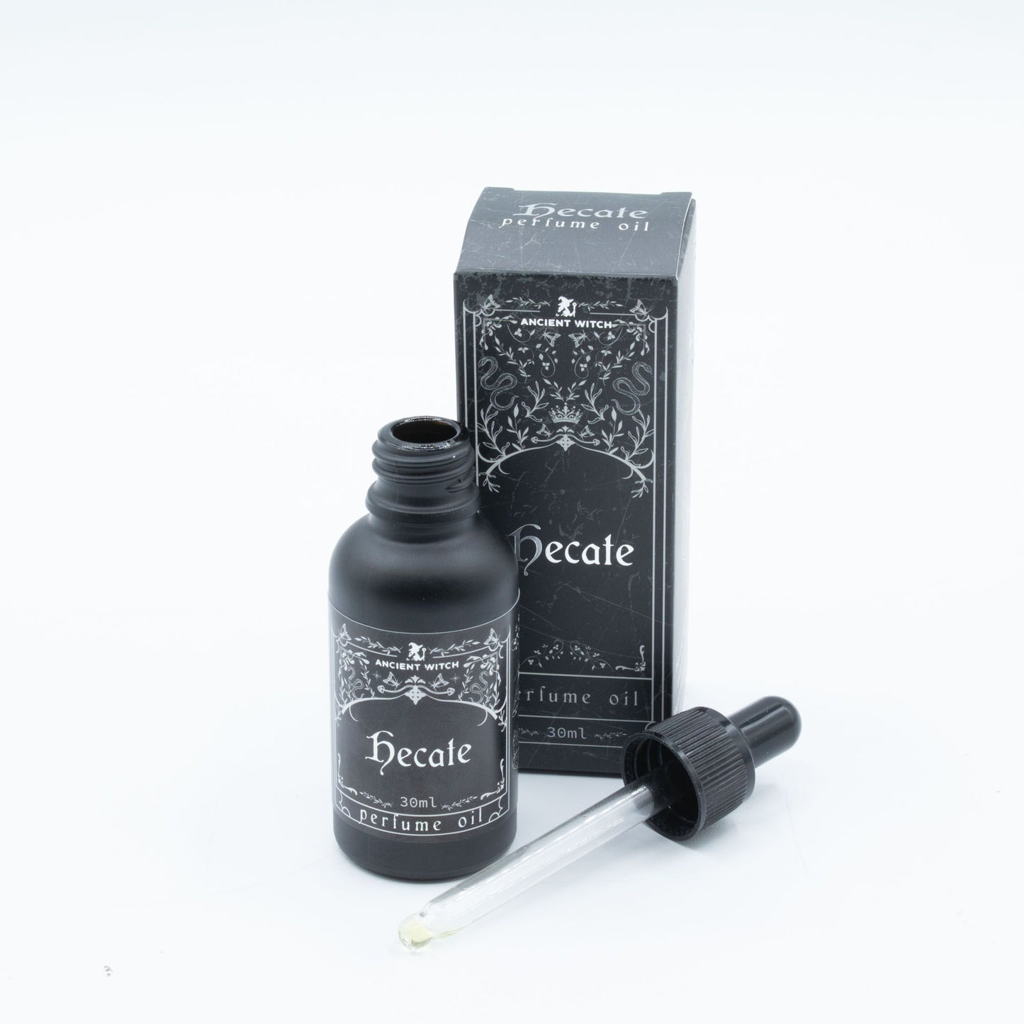 Black bottle of Hecate perfume oil with a dropper and its box.