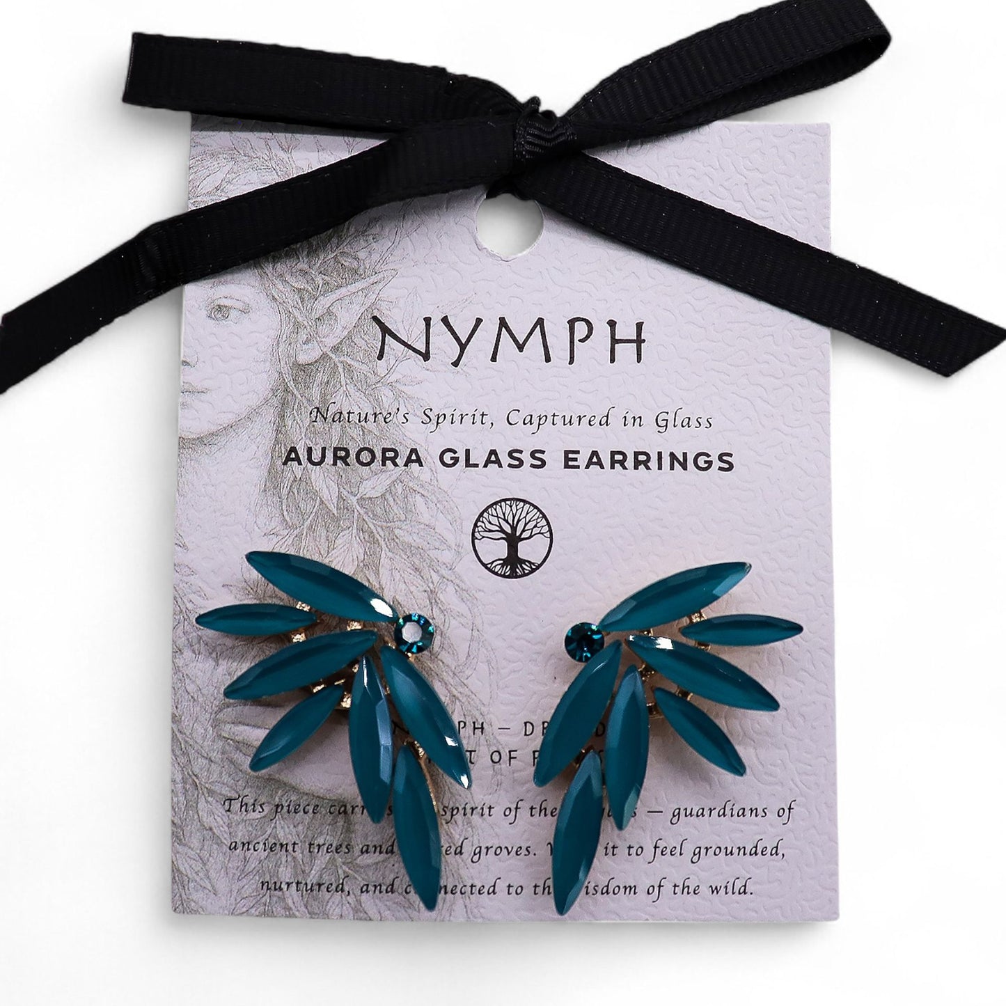 Teal green vintage glass earrings with a black ribbon on a card.