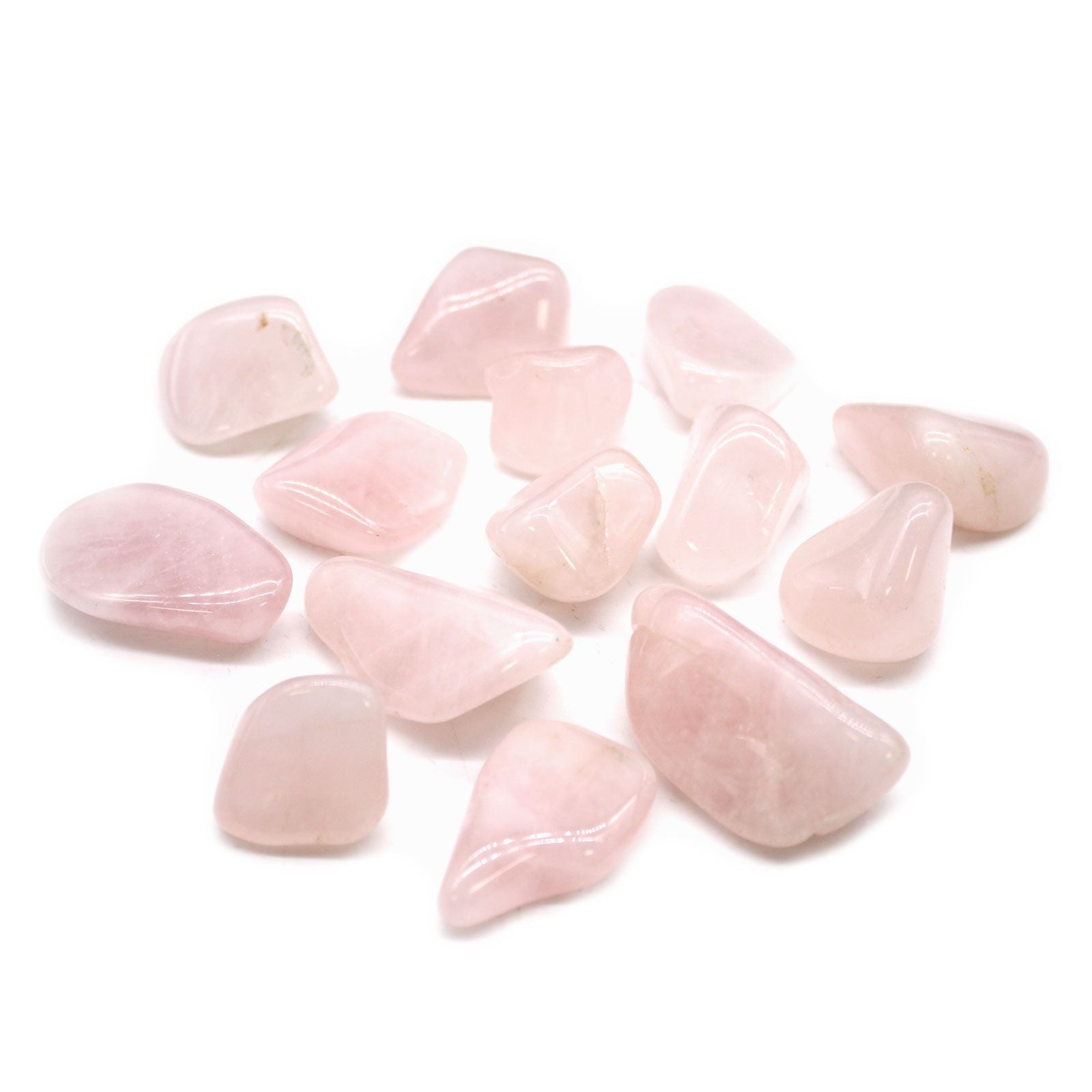 A collection of smooth, tumbled rose quartz stones on a white background.