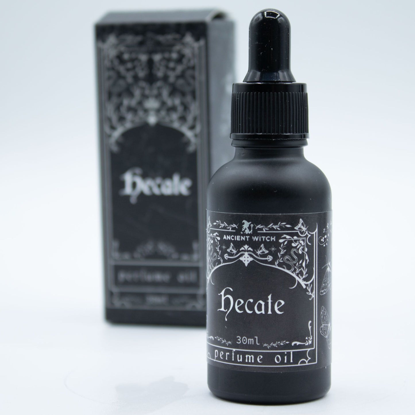 Black bottle of Hecate perfume oil with ornate label.