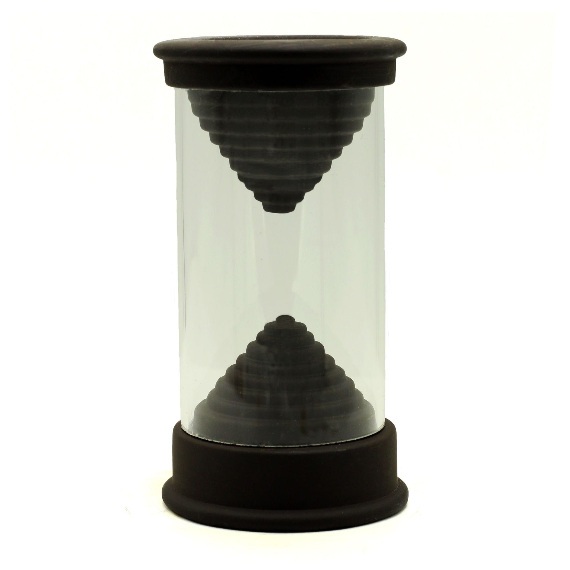 Räucherhalter mit zwei konischen Ebenen aus dunklem Material in einem Glaszylinder.