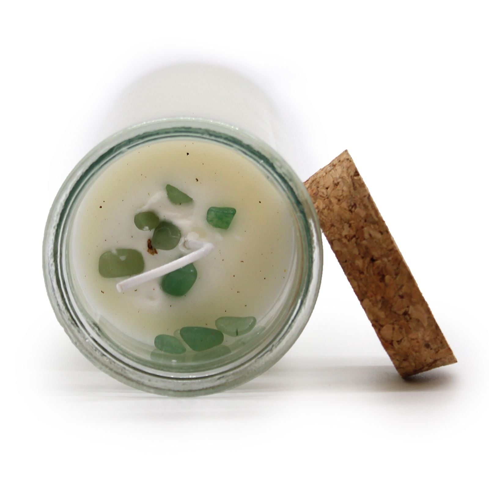 Ritualkerze mit Sojawachs, Edelsteinen und Duftölen in einem Glasbehälter.