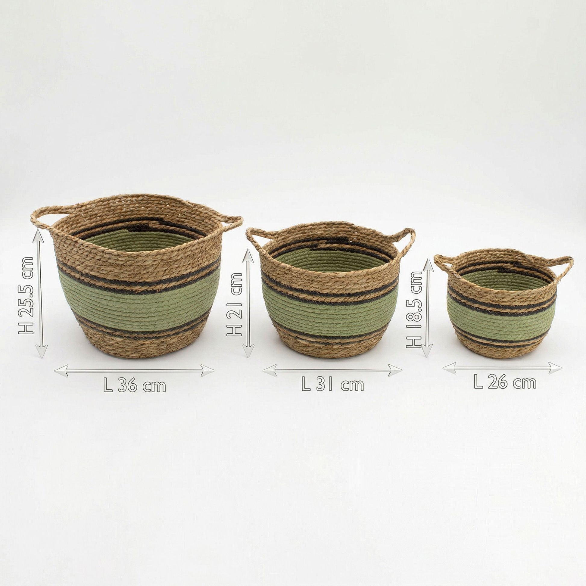 Set of three natural seagrass baskets with green and black bands.