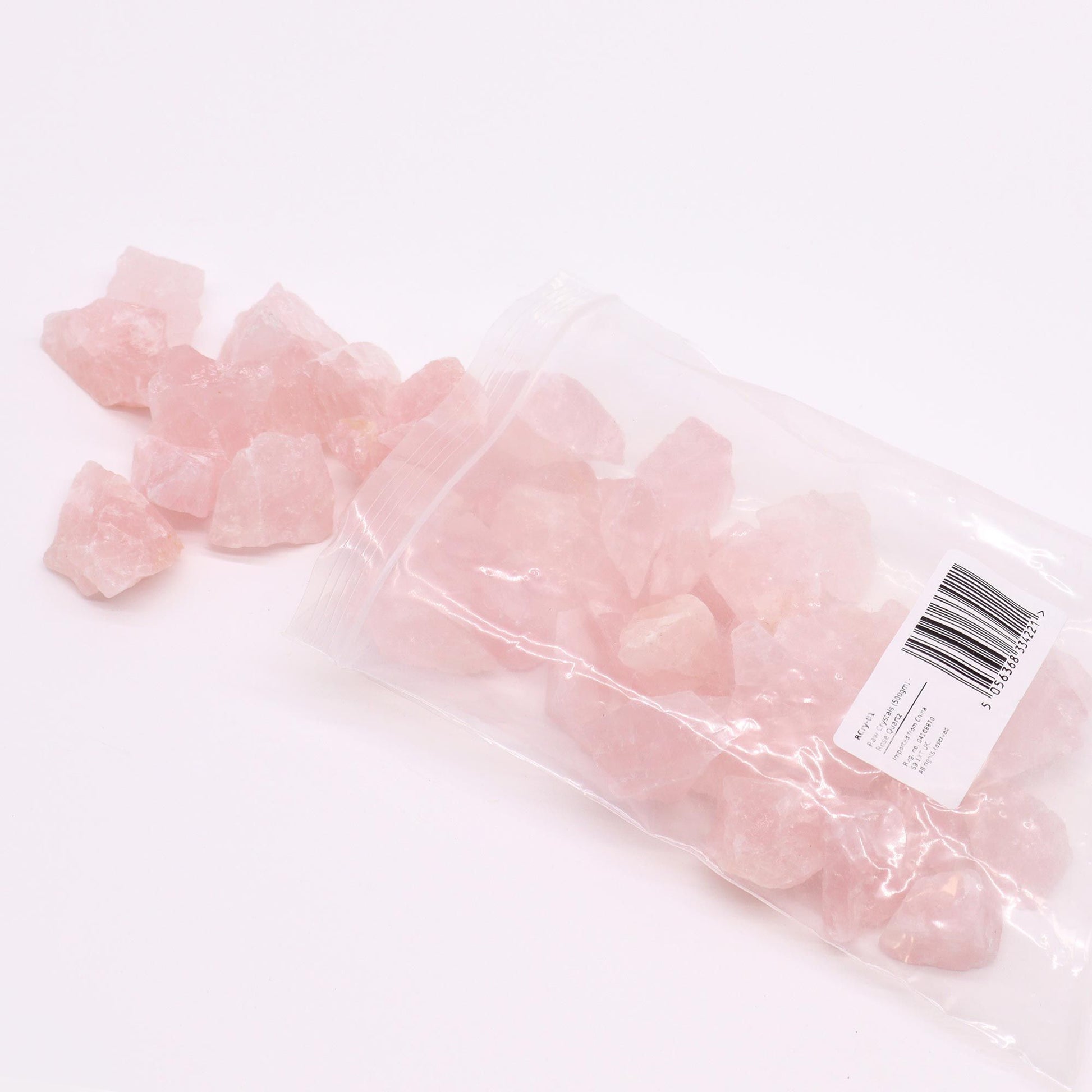 Rosenquarz-Rohsteine in einer Plastiktüte, 500g.