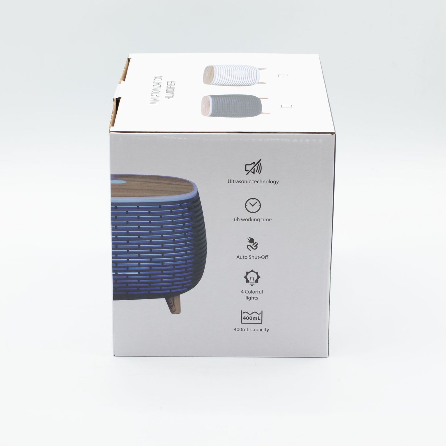 Aromatherapy diffuser with futuristic ribbed design, wood top, and colorful lights.