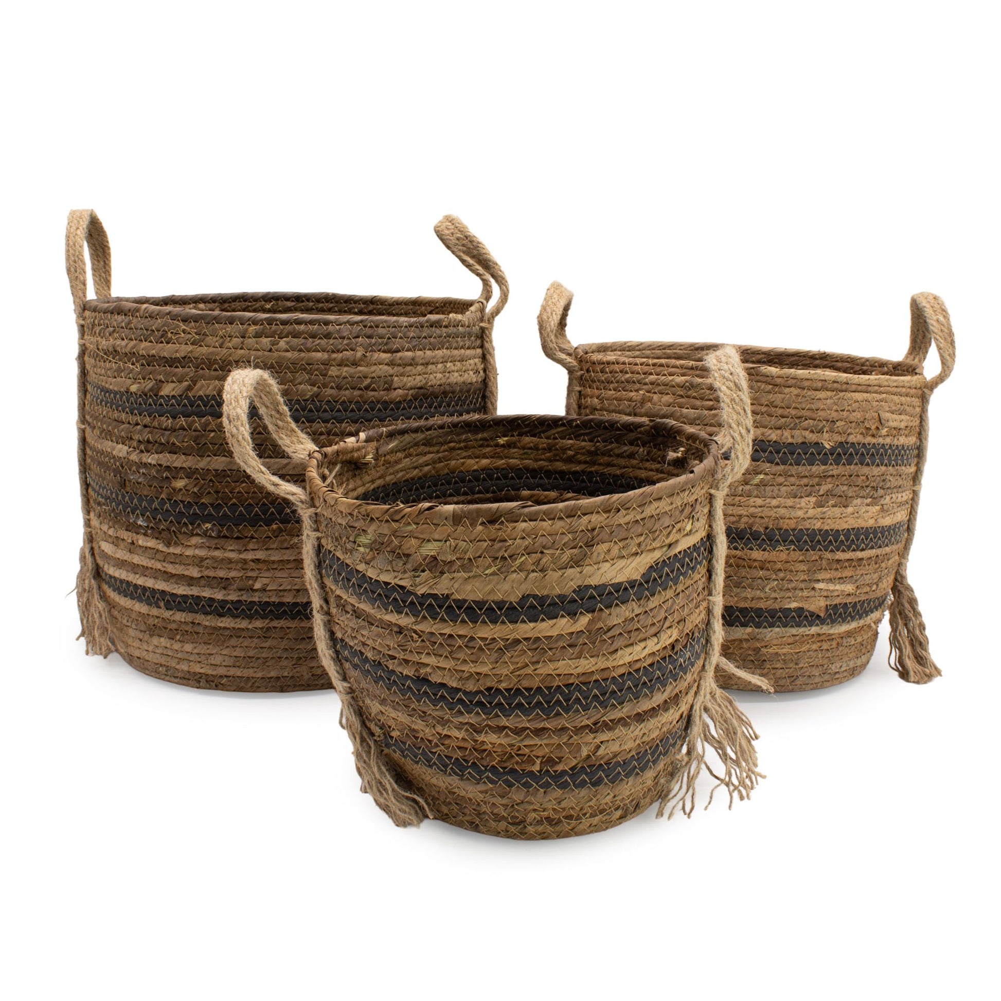 Set of 3 natural brown banana leaf and seagrass baskets with striped detailing and rope handles.