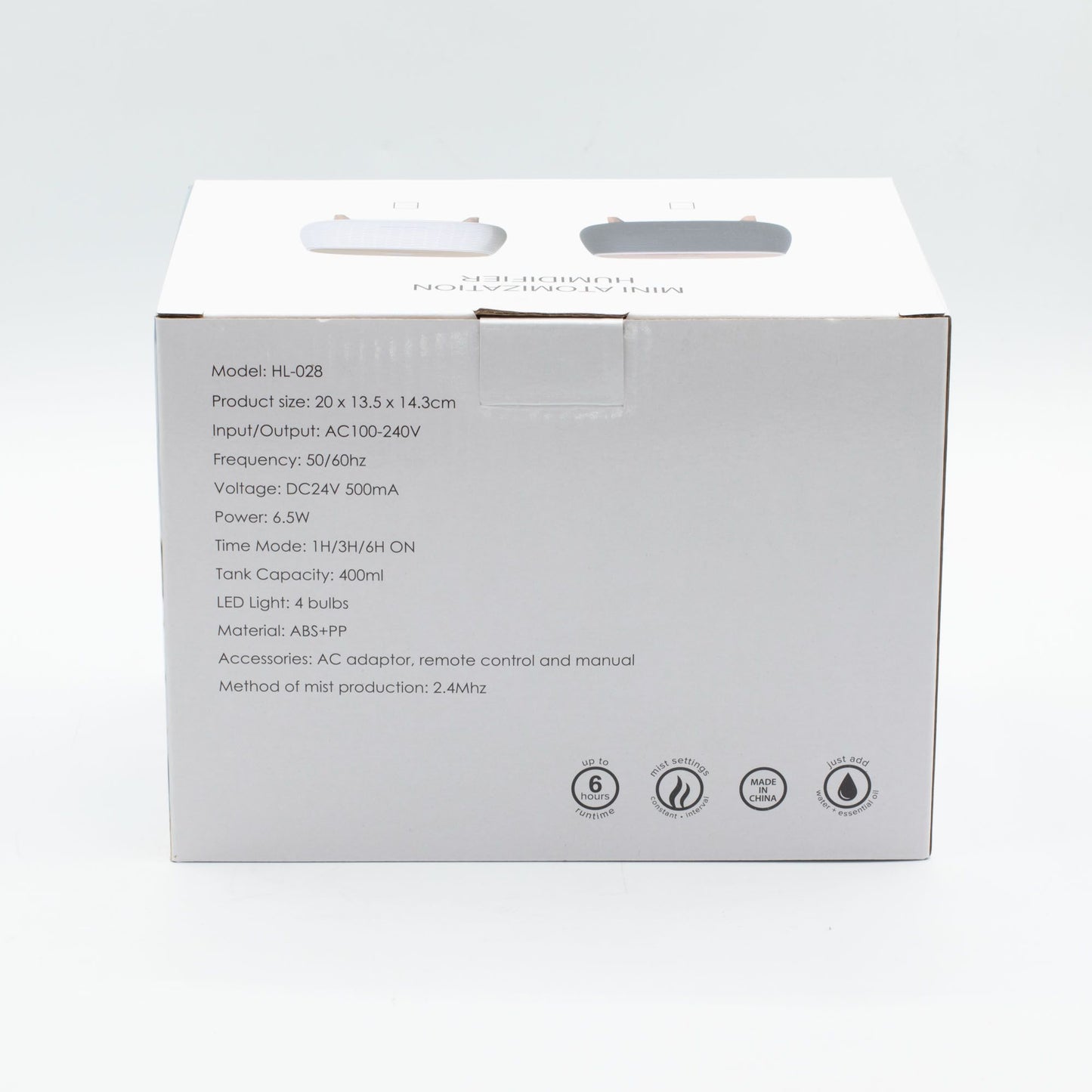 Aromatherapy diffuser with ribbed design, colour-changing light, and remote control.