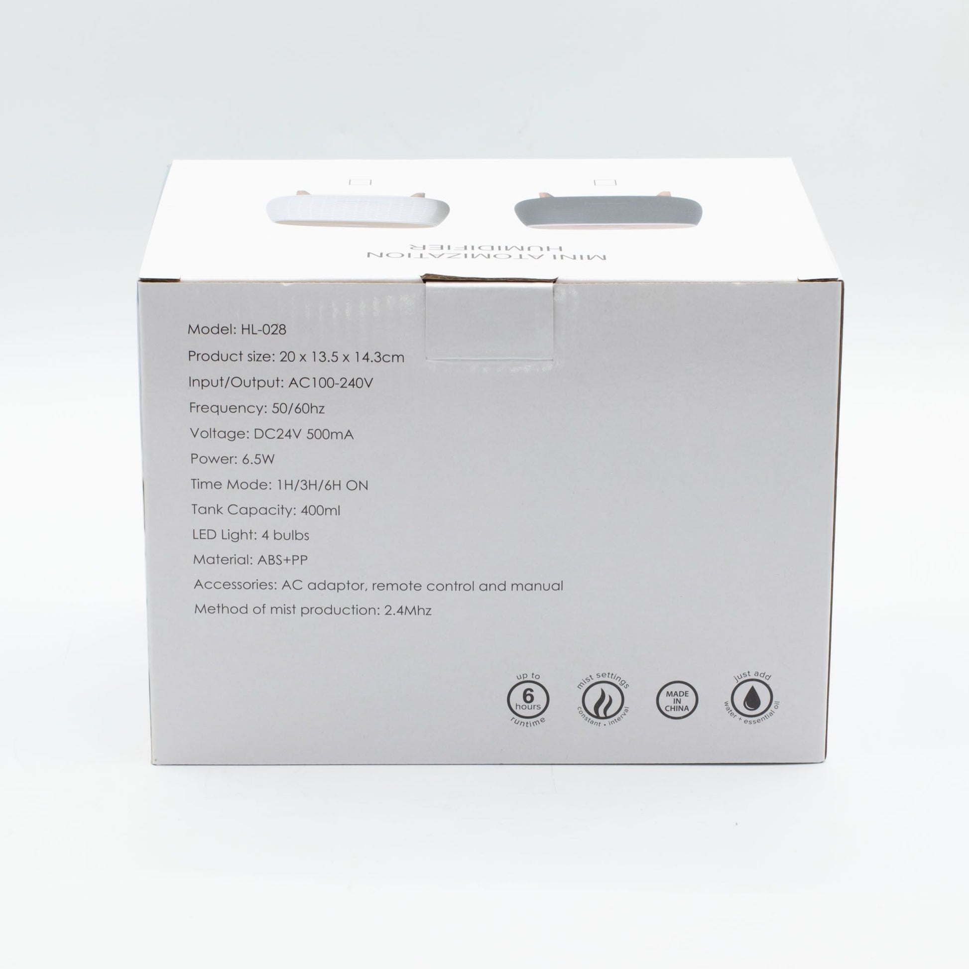 Aromatherapy diffuser with ribbed design, colour-changing light, and remote control.