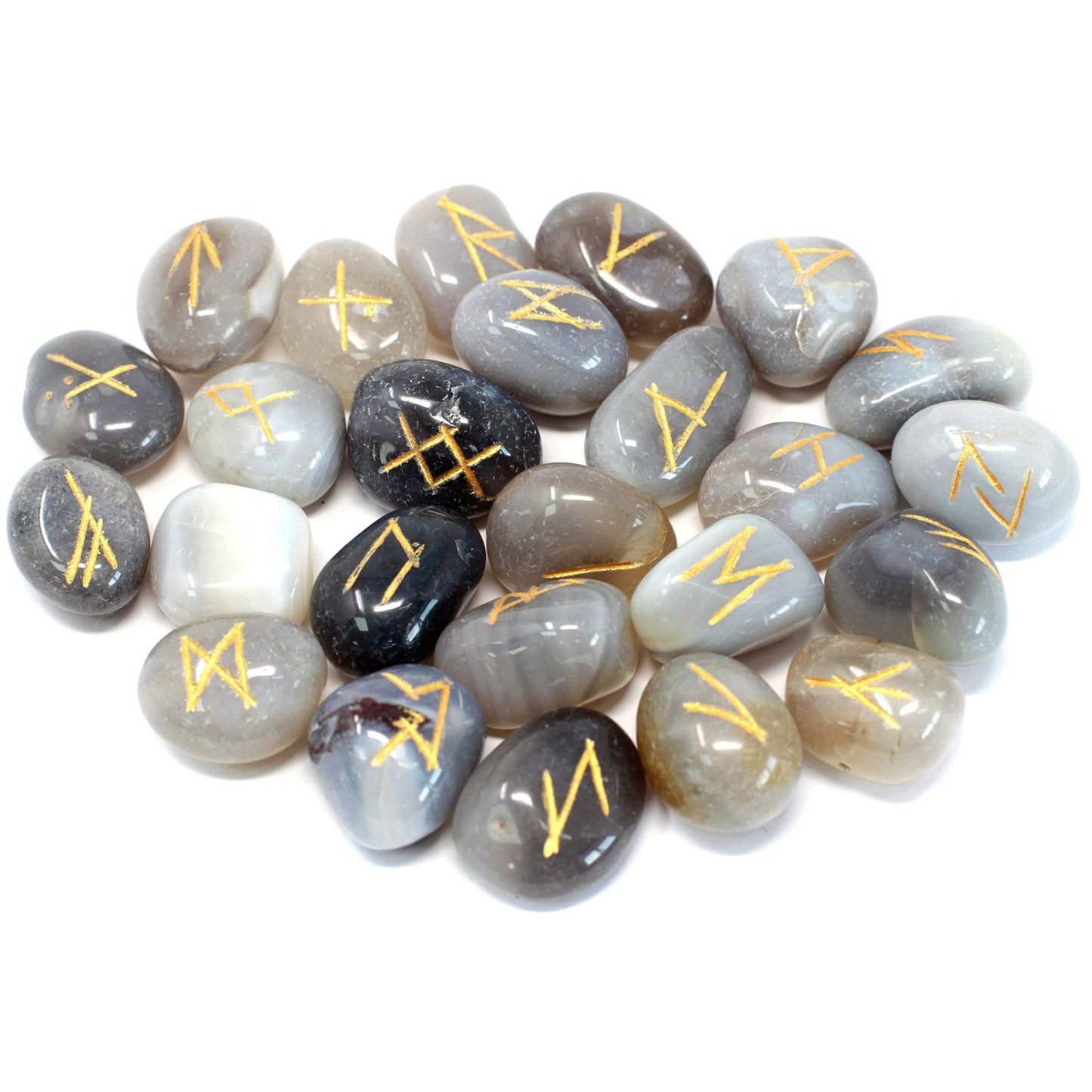 A set of grey agate rune stones with gold symbols on a white background.