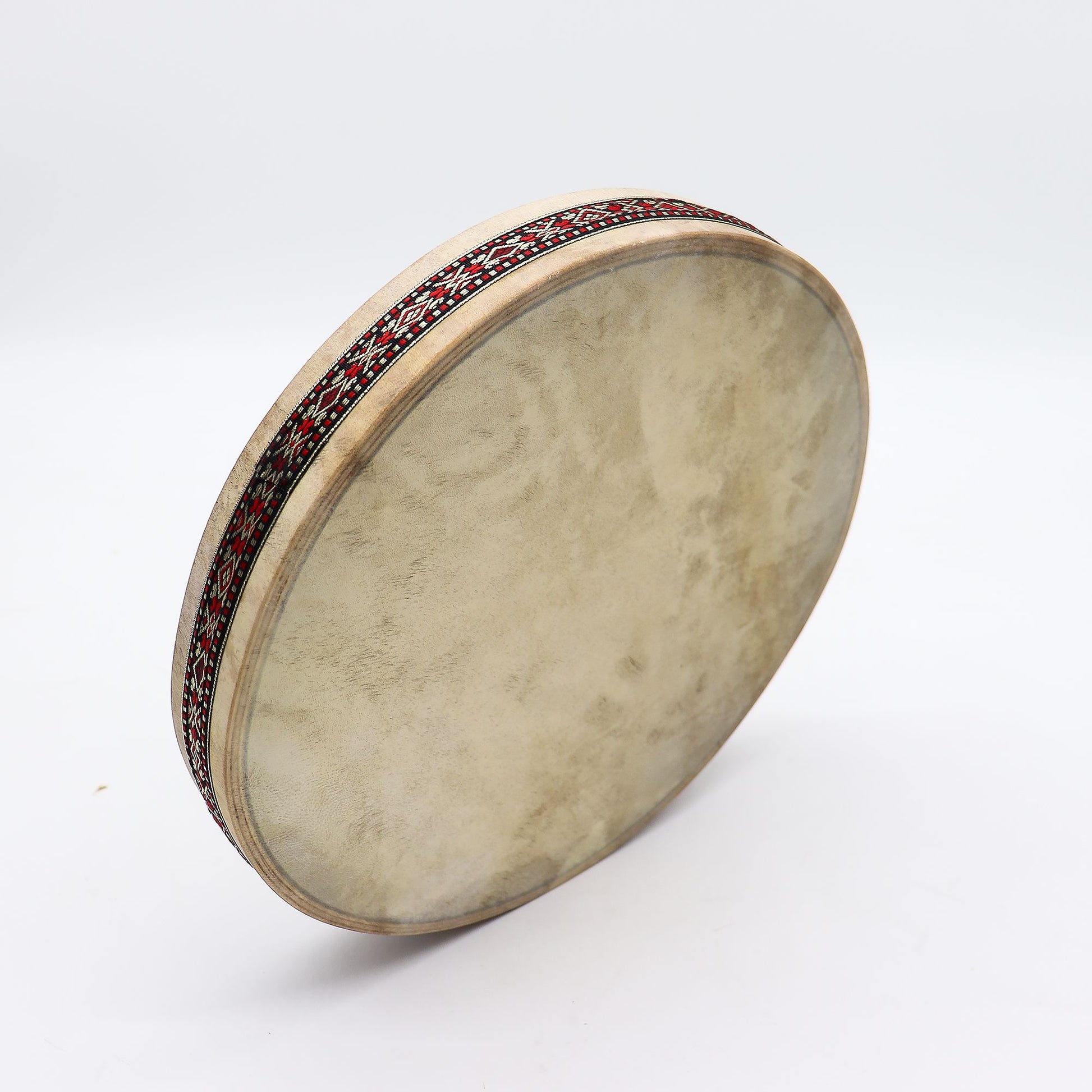 A 30cm shaman ocean drum with a goatskin head and decorative patterned frame.