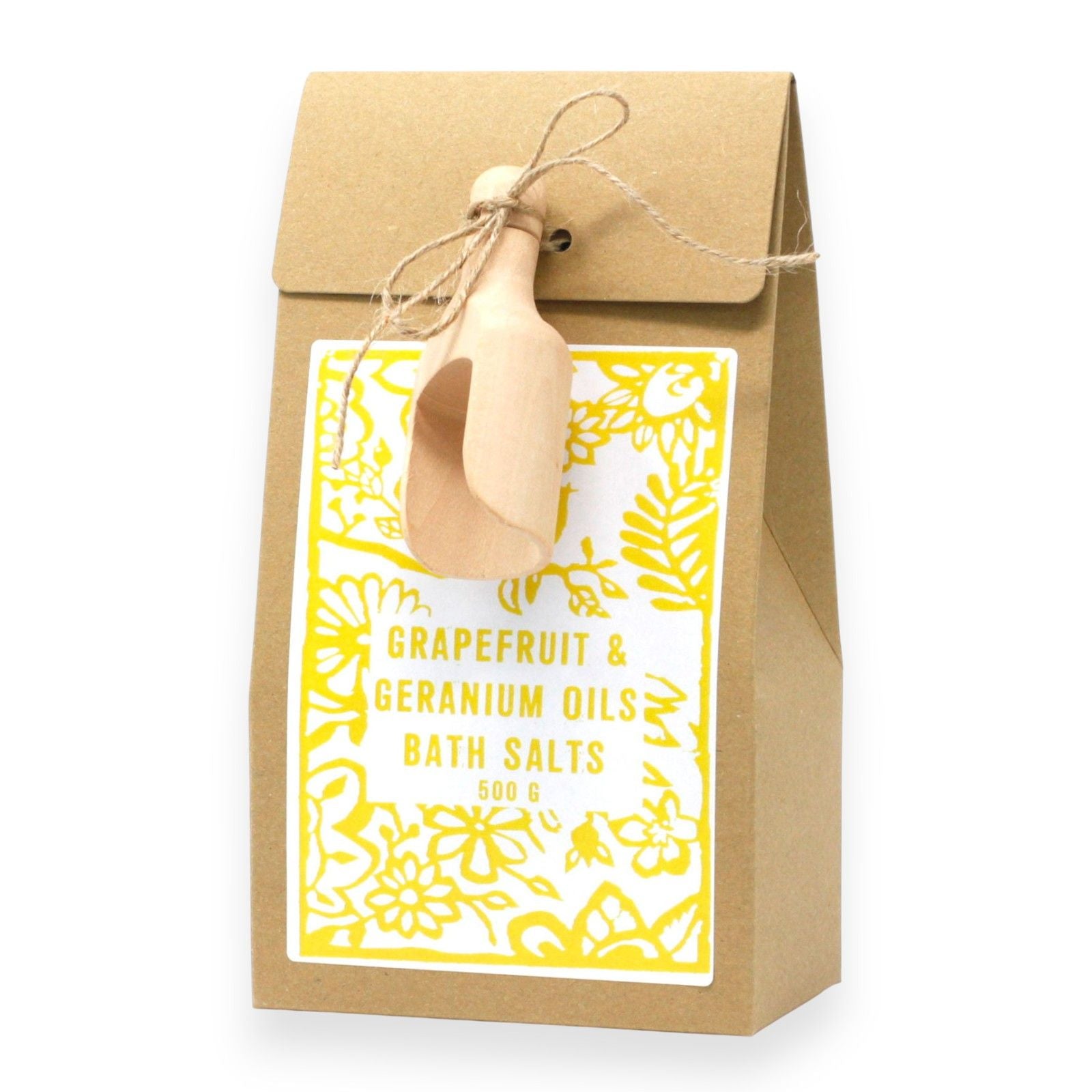 Braune Papiertüte mit Grapefruit & Geranium Badesalz und Holzlöffel.