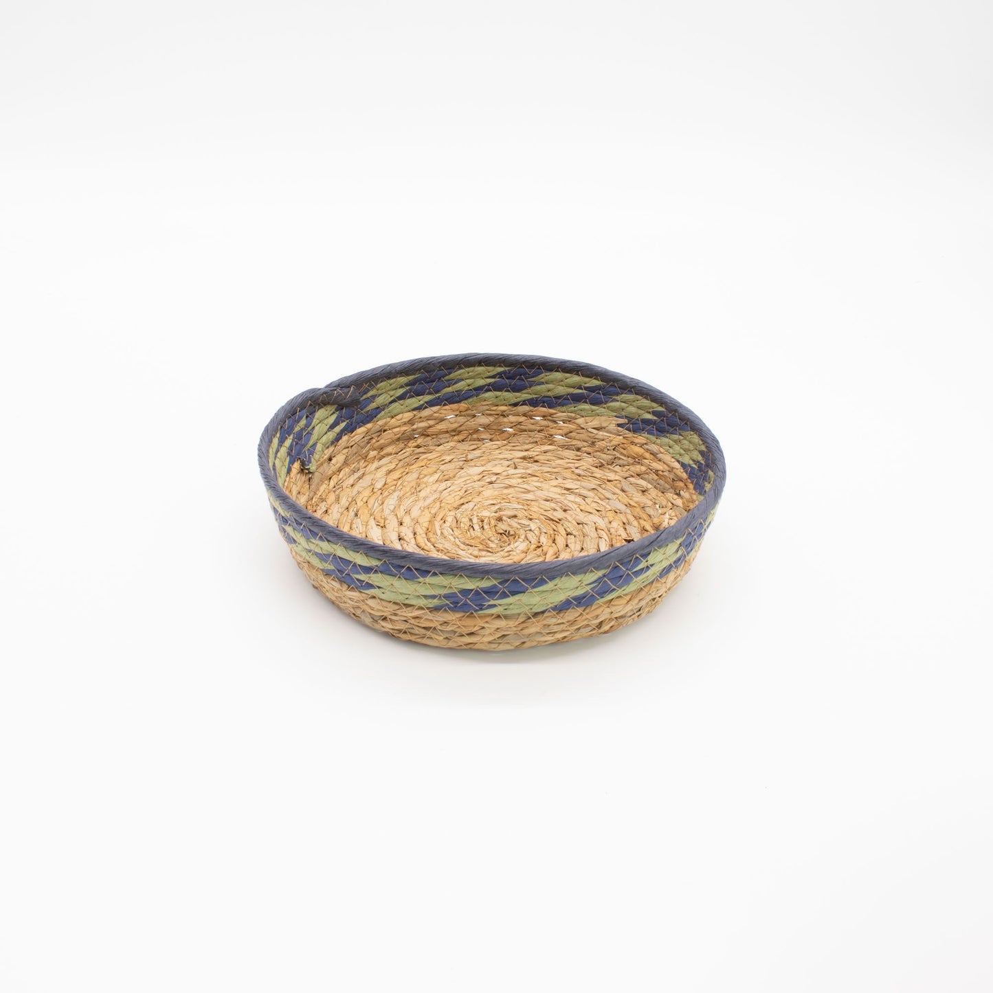 Round woven straw and seagrass tray with blue and green trim.