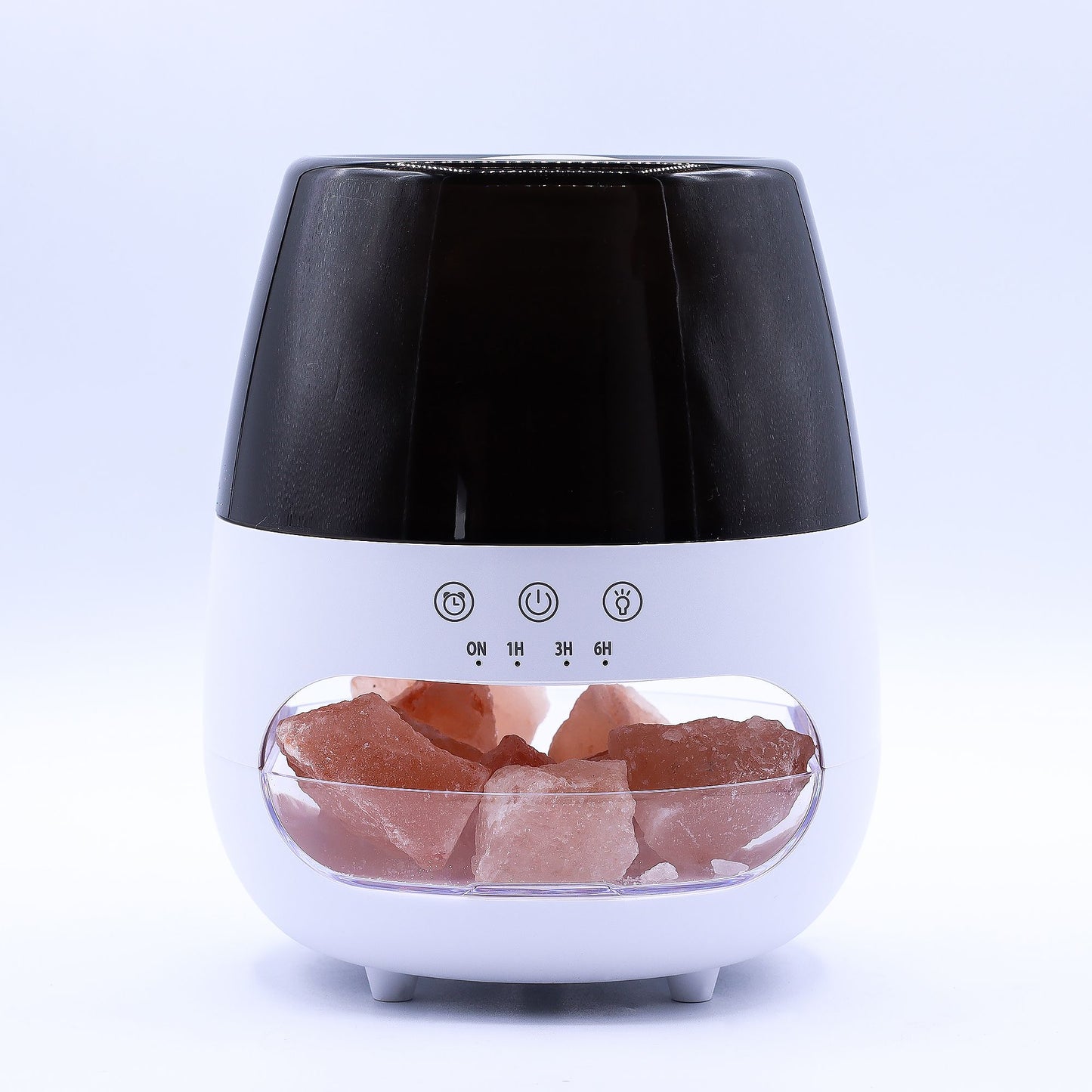 White aroma diffuser with salt stones, flame effect light, and timer controls.