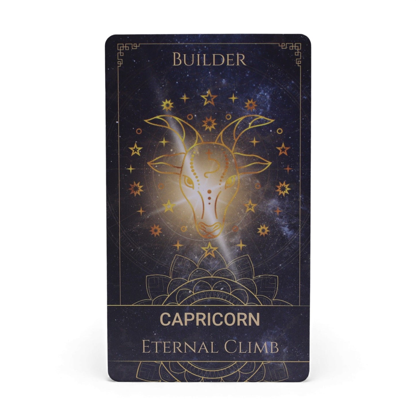 Capricorn Orakelkarte mit Widderkopf und Sternenmotiv.