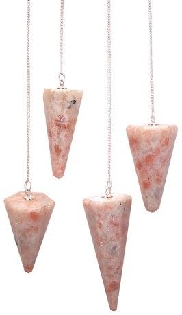 Four sunstone pendulums hang from silver chains.