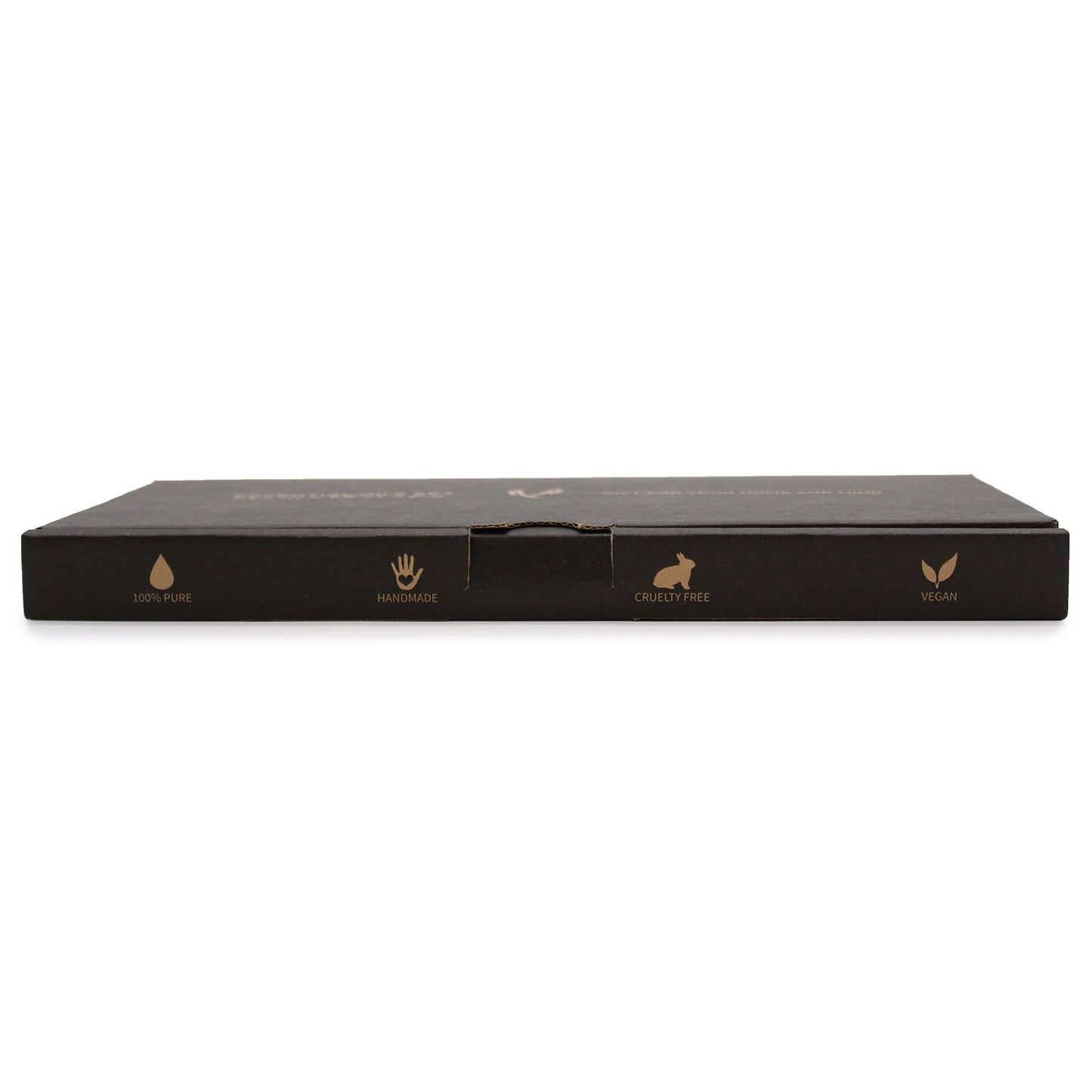 Schwarze Box mit Symbolen für 100% rein, handgemacht, tierversuchsfrei und vegan.