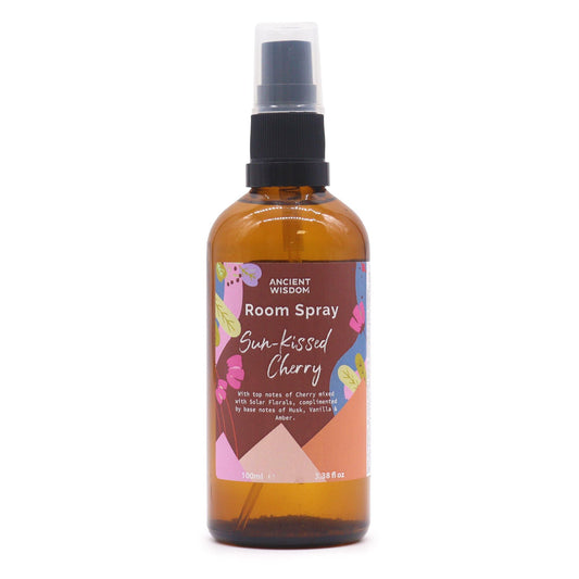 Amber glass room spray bottle with a Sun-Kissed Cherry label.
