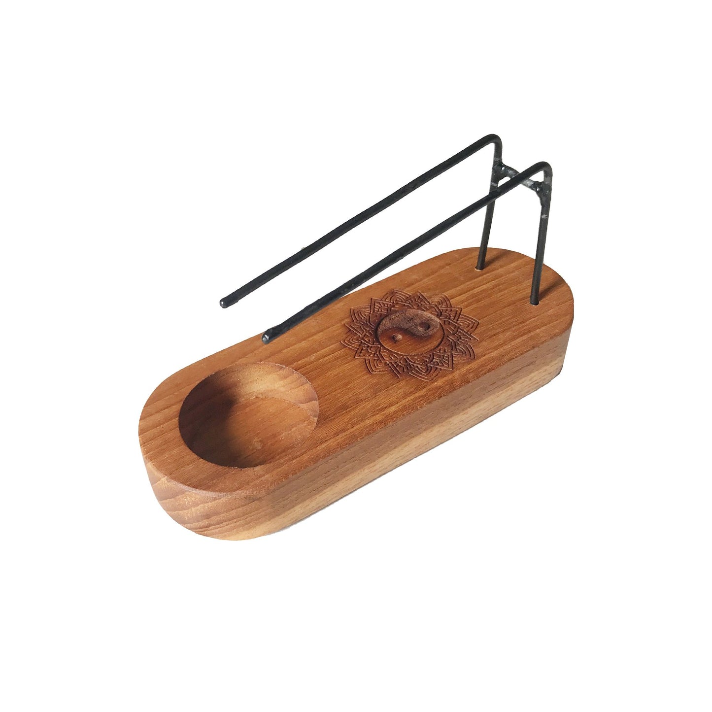 Small teak wood palo santo heater with yin and yang design.
