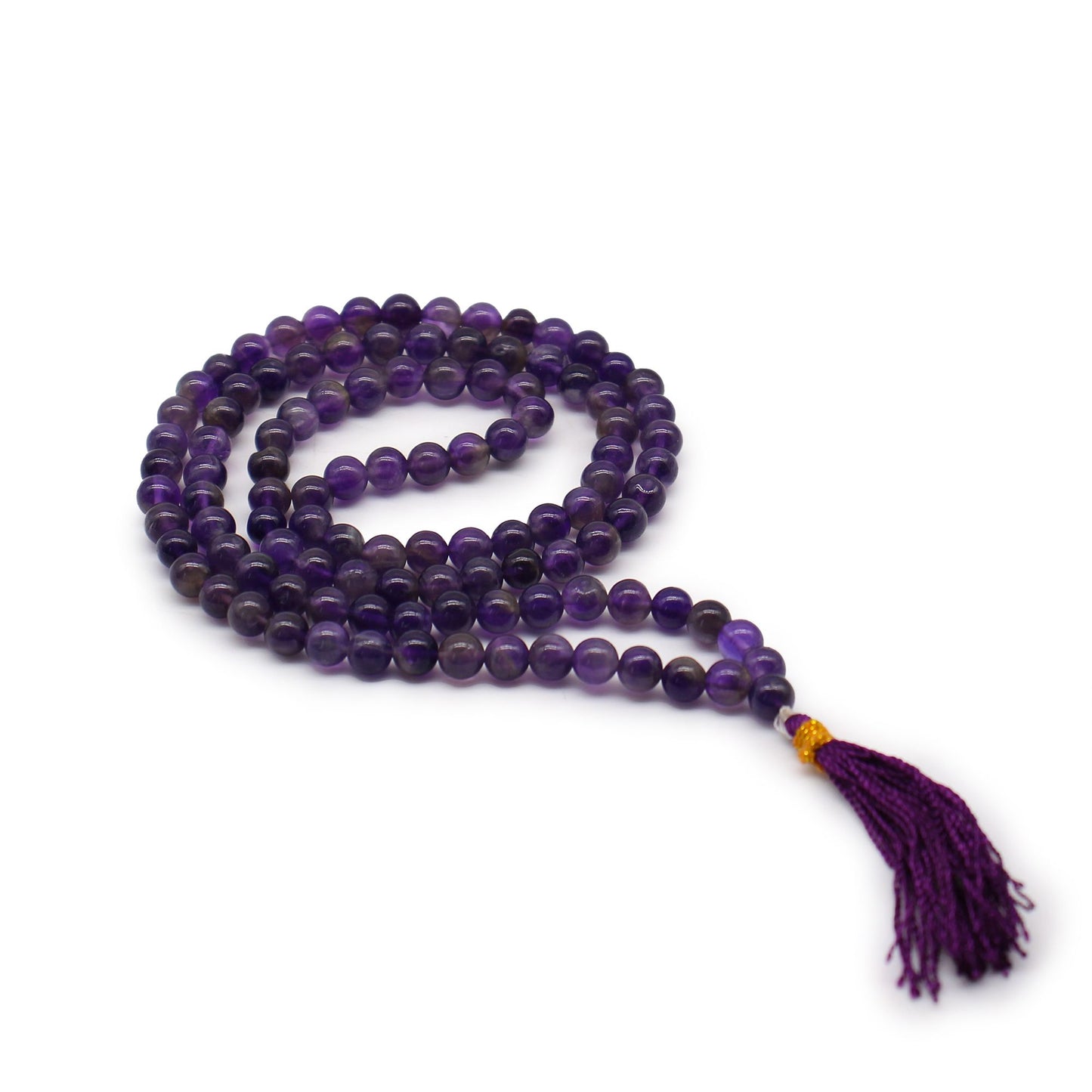 108 bead mala made of purple amethyst with a tassel.