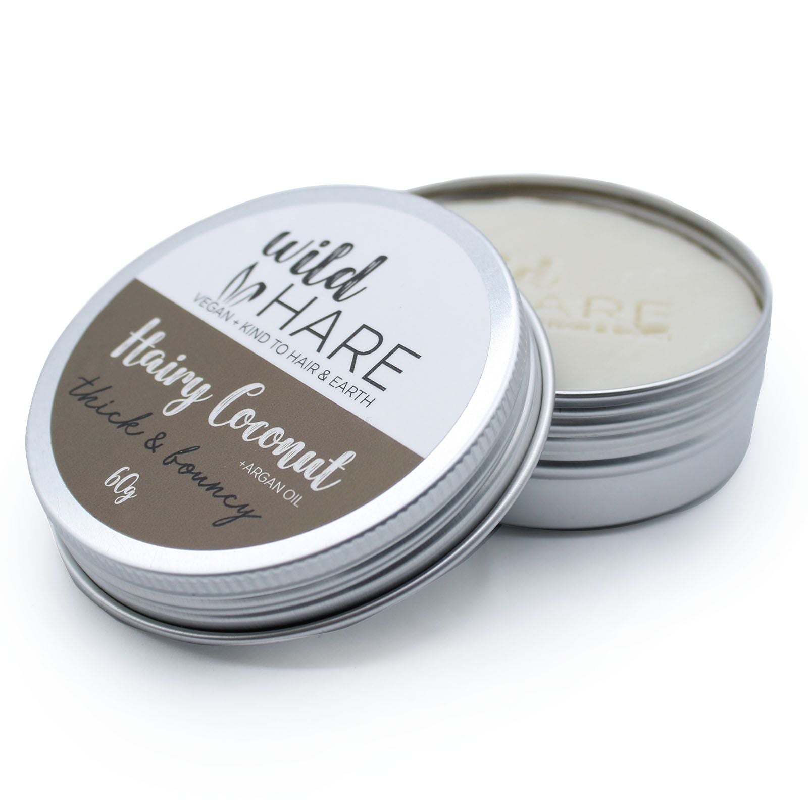 Wild Hare Hairy Coconut solid shampoo bar in a tin.