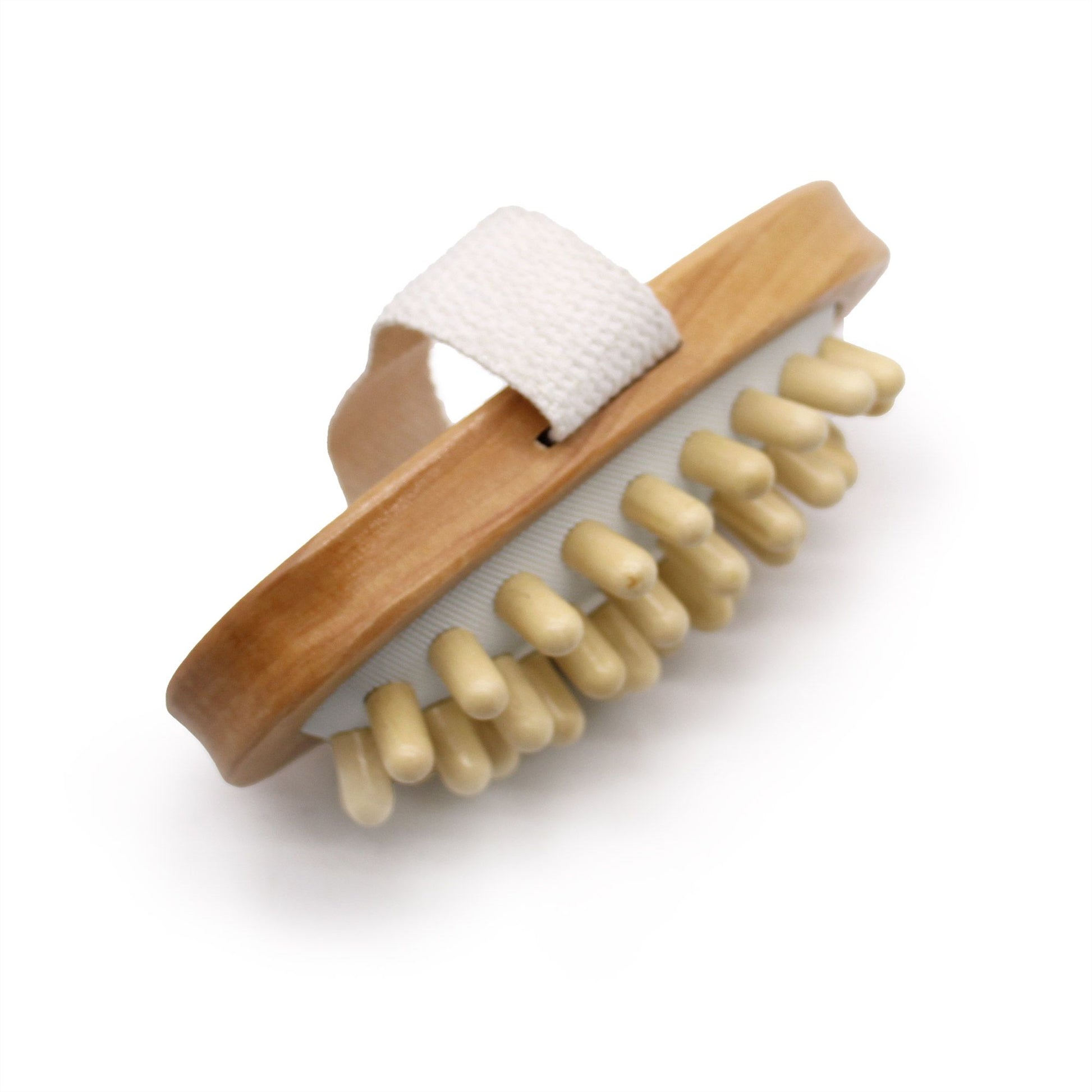 Holz-Massagebürste mit Noppen und weißem Band zur Hautstraffung.