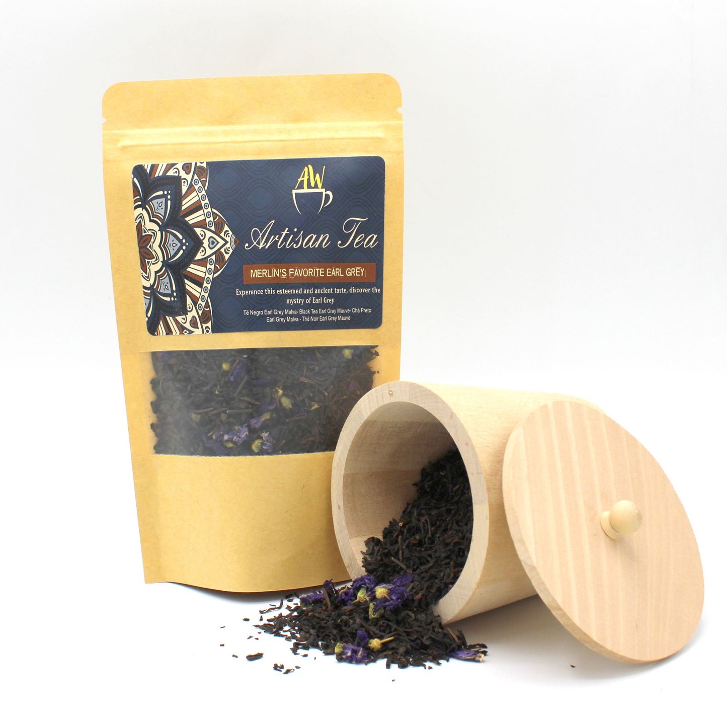 A bag of Merlin's Favorite Earl Grey tea next to a wooden container of loose tea.