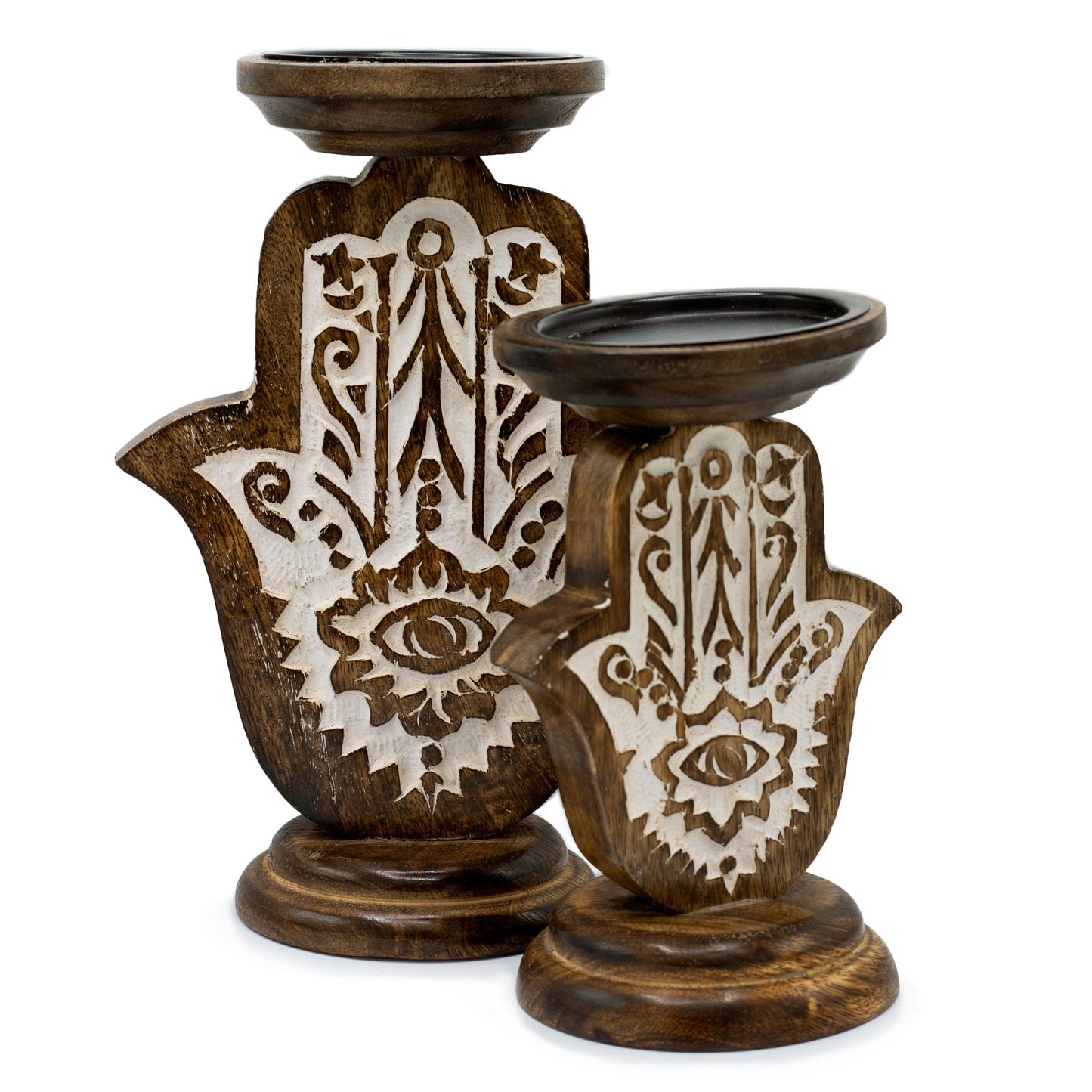 Two wooden Hamsa hand candle holders with carved details on a white background.