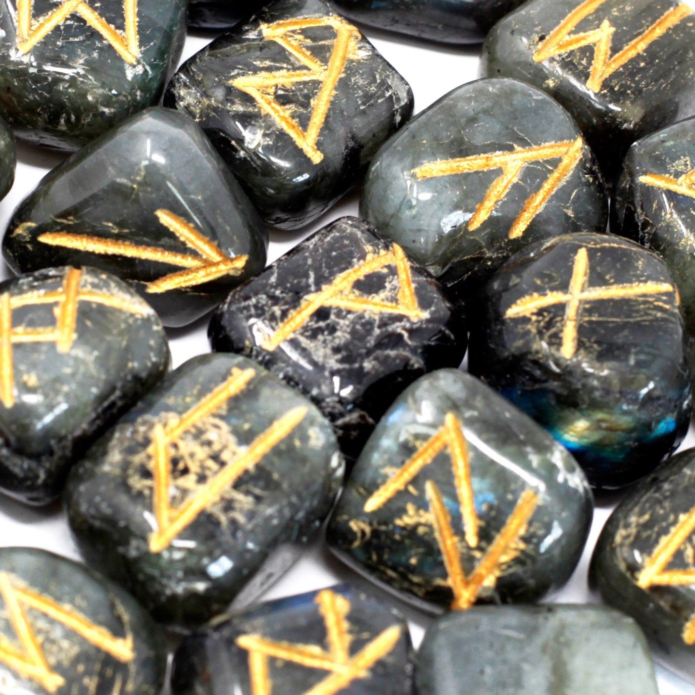 Labradorite rune stones with gold symbols.