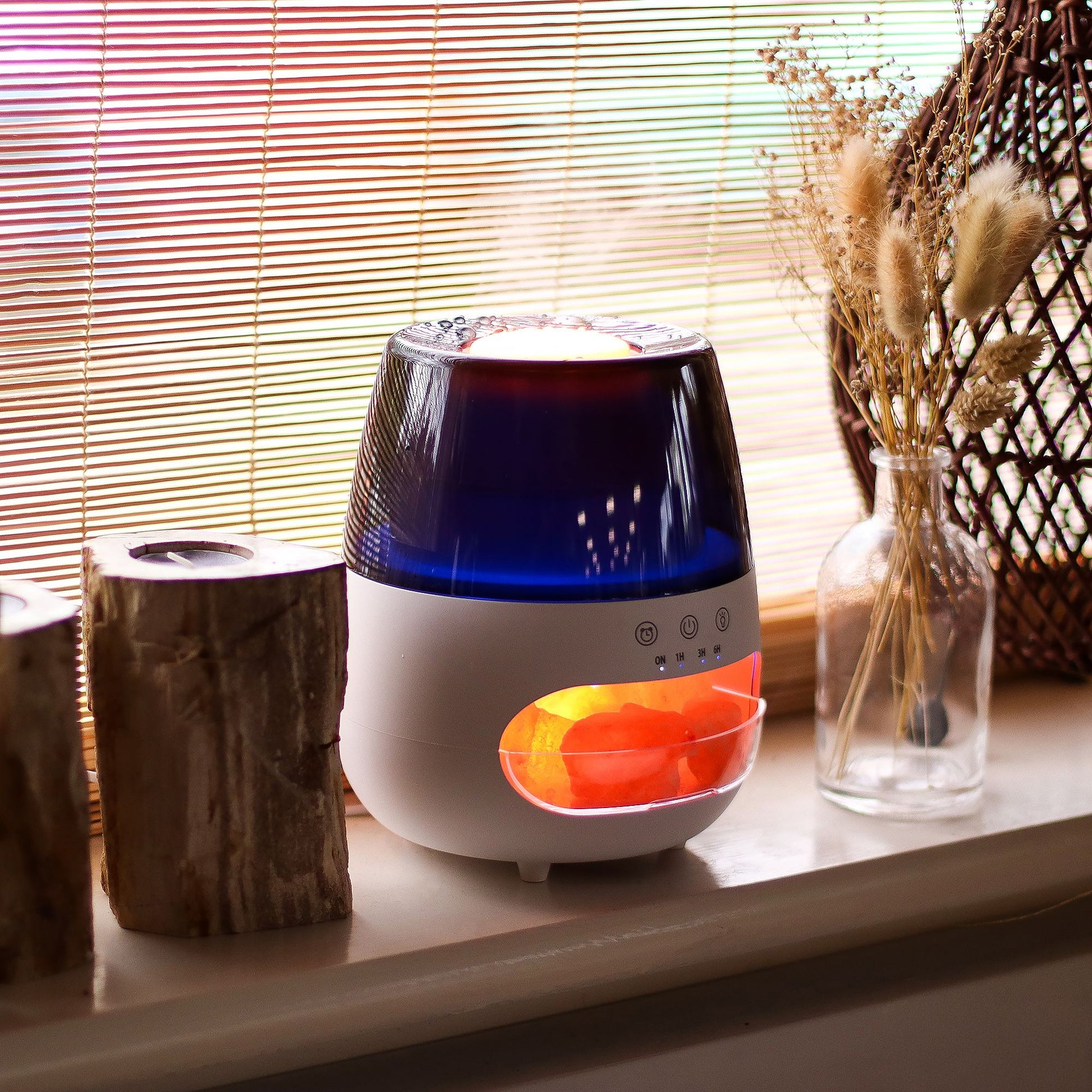 White aroma diffuser with flame effect light and color change.