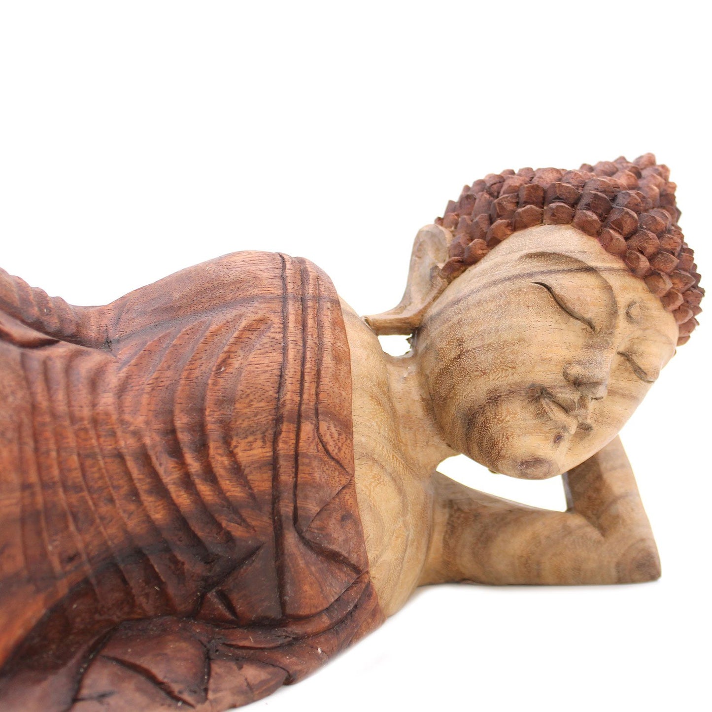 Hand carved wooden sleeping Buddha statue with detailed robe and hair.