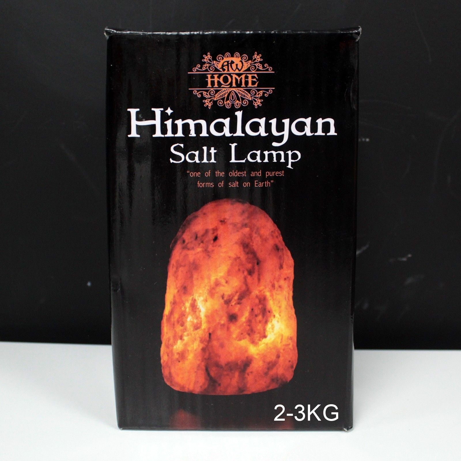 A natural Himalayan salt lamp with a rough texture, weighing 2-3kg.
