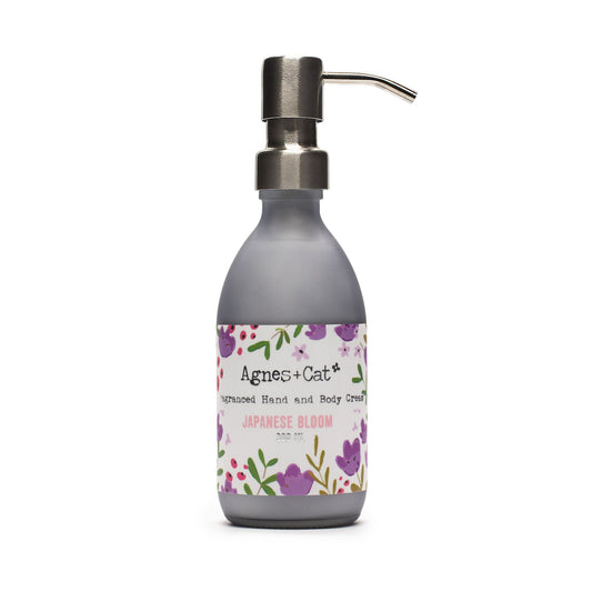 Agnes+Cat Japanese Bloom fragranced hand and body cream in a grey pump bottle.