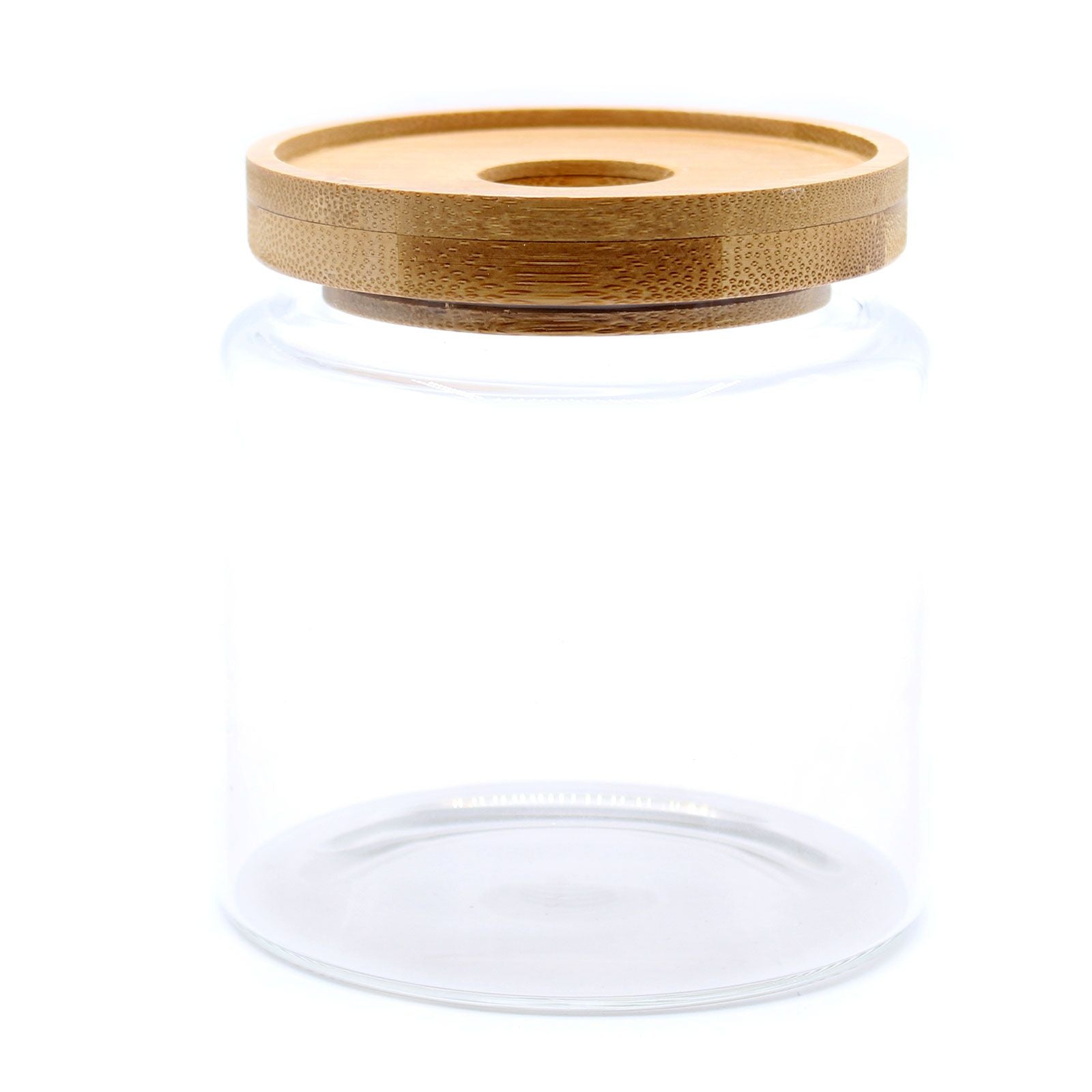 Vorratsglas aus Glas mit rundem Bambusdeckel.