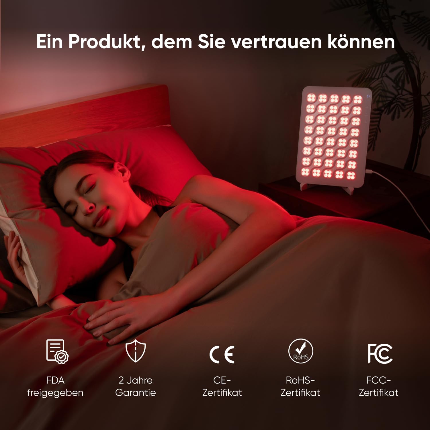 Ein Nanoleaf Rotlichttherapie-Panel mit Zertifizierungen liegt neben einer schlafenden Person.